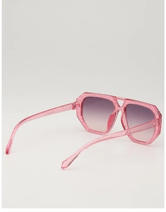 Detail of pink glitter polygonal frames and purple gradient lenses on kids sunglasses