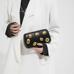 Chic black PU leather box clutch bag with artistic gold metal accents and chain strap