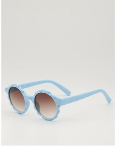 Detail of round flower-shaped kids sunglasses with sky blue frame and gradient lenses