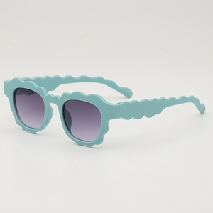 Retro wavy frame sunglasses for kids with matte light blue finish and gradient lenses