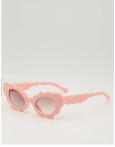 Detail of pink cloud-shaped kids sunglasses with stylish wavy frame and temples