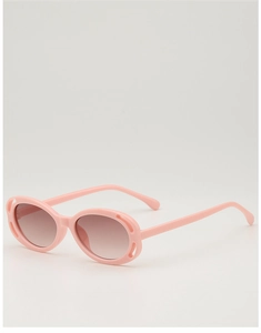 Detailed close-up of pink hollowed-out frames and gradient lenses on kids sunglasses