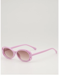 Detailed close-up of pink hollow-out frame kids sunglasses with brown gradient lenses