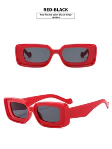 Detail view of retro red thick rectangular sunglasses with dark grey resin lenses