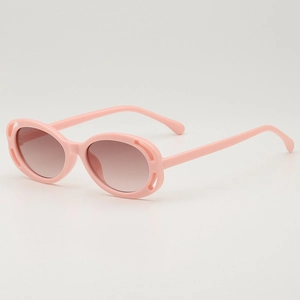 Pink oval kids sunglasses with hollow frames and gradient brown lenses for UV protection