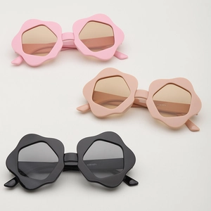 Kids flower frame hexagon sunglasses in pink and black colors with UV protection