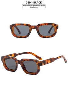Detail view of stylish square tortoise sunglasses featuring protective dark grey lenses