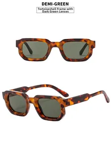 Detail view of tortoiseshell square sunglasses with dark green lenses and metal hinges