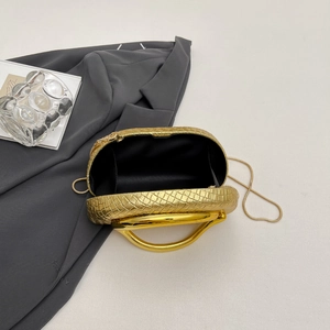 Golden luxury metal evening clutch with woven texture, round handle and chain strap