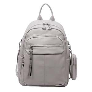 Close-up of light grey faux leather backpack with litchi texture and silver zipper details
