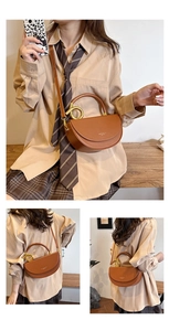 Brown semi-circle saddle bag with gold ring handle and adjustable strap for women