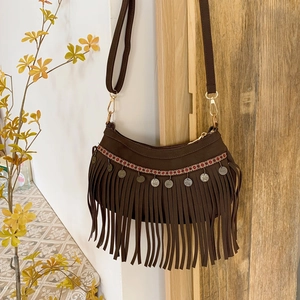 Brown faux suede crossbody bag with ethnic embroidery and long bohemian tassels