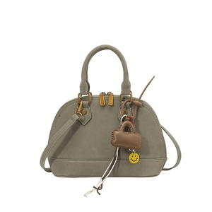 Retro grey shell-shaped handbag with golden hardware and cute charms for women