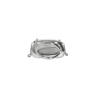 Detailed view of silver mirror capsule clutch with avant-garde metallic chain strap