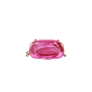 Pink metallic crossbody evening bag with round handle and gold chain strap