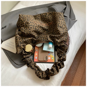 Detailed view of the large leopard print tote bag interior capacity for daily essentials