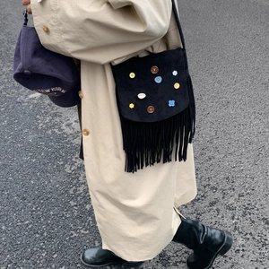 Vintage black suede crossbody bag with bohemian tassels and colorful button accents