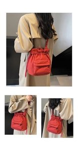 Detailed views of a red nylon drawstring bucket bag with a small front pocket and shoulder strap