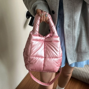Pink metallic quilted puffer handbag with top handle and crossbody strap for women