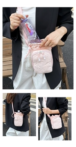 Pink drawstring nylon water bottle bag with zipper pocket for sports and outdoor use