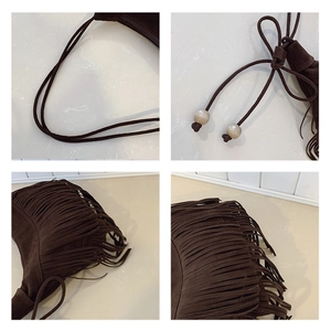 Detail view of coffee suede bucket bag with fringe tassels and white pearl accents