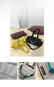 Wasserdichte Nylon-Reisetasche mit gewebten Seilgriffen und robustem zylindrischem Design