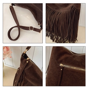 Detail view of coffee suede tassel bag with golden hardware and adjustable strap