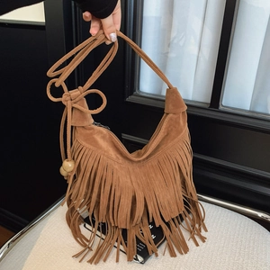 Vintage brown suede hobo bag with long fringes, wooden beads and adjustable strap