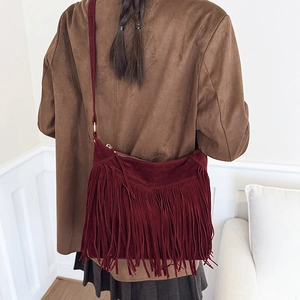 Bohemian burgundy suede shoulder bag with long fringes and large capacity tote design