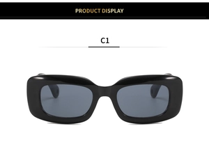 Front view of black rectangular thick frame sunglasses with dark lenses and glossy finish