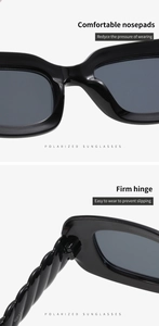 Detail of reinforced metal hinges and integrated nose pads on black polarized sunglasses