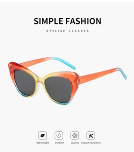 Detail of colorful gradient cat-eye sunglasses frame with transparent finish and dark lenses