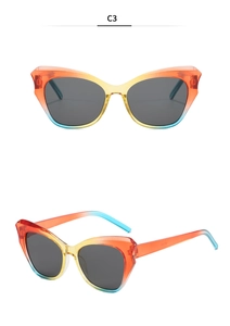 Cat eye sunglasses with orange, yellow and blue gradient frame and dark grey lenses
