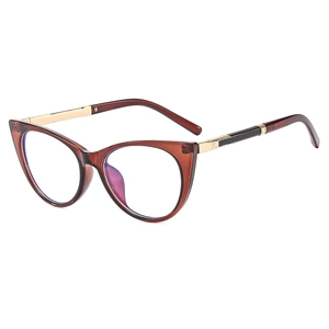Chic cat eye glasses with amber translucent frames and golden metallic temples