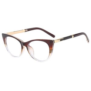 Vintage cat-eye glasses with brown tortoiseshell gradient frames and gold metal temples