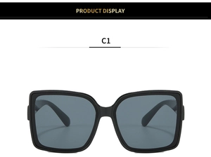 Detail view of bold white frame square sunglasses with dark grey lenses in C1 color