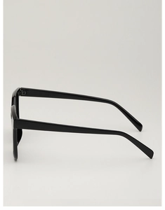 Macro side view of thick black acetate sunglasses with polished finish and sturdy hinges