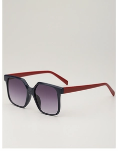 Detail of square sunglasses featuring deep blue frames and vibrant red contrast temples