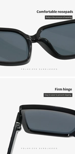Detail of integrated nose pads and reinforced metal hinges on black polarized sunglasses