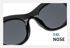 Detail view of the comfortable integrated nose bridge on trendy round frame sunglasses