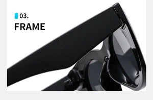 Macro shot of thick black cat-eye sunglasses frame showing polished hinges and sleek finish