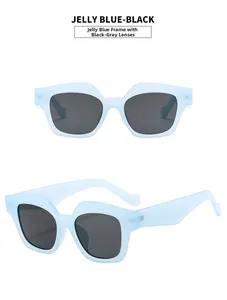 Detail view of jelly blue cat eye sunglasses with grey lenses in dual perspectives