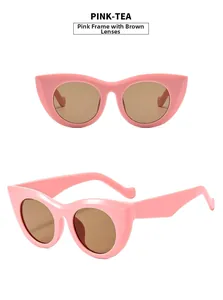 Detail view of pink cat eye sunglasses featuring thick frames and tea tinted lenses