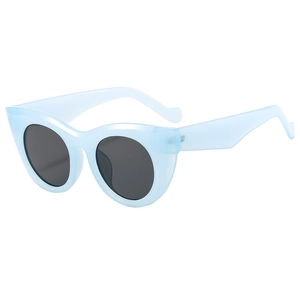 Fashionable oversized cat-eye sunglasses with ice blue frame and dark lenses