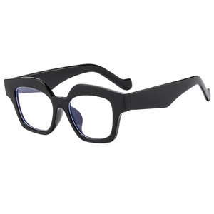 Retro black cat-eye sunglasses with thick irregular frames and wide temples for women