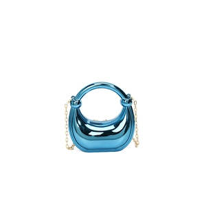 Detail of metallic blue crescent evening bag with gold chain strap and round top handle