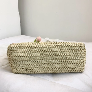 Handwoven straw tote bag with large capacity and natural cross-stitch texture for summer