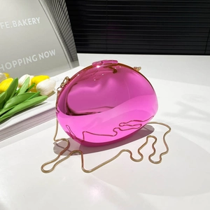 Pink metallic oval clutch bag with gold snake chain and mirror finish shell