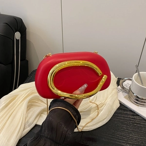 Elegant red acrylic round evening bag with gold lip metal handle and shoulder chain strap