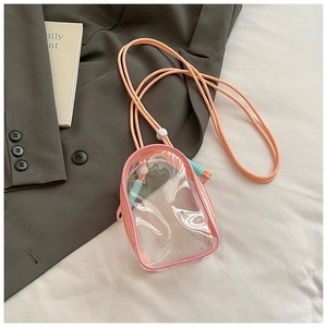Detail of pink transparent PVC jelly bag with adjustable strap and smooth zipper edges
